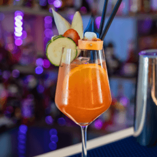 https://vilapalace.ro/wp-content/uploads/2024/09/fresh-orange-cocktail-decorated-with-cucumber-and-2023-11-27-05-28-45-utc-320x320.png